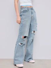 Mid Rise Ripped Straight Leg Jeans