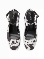 COWHIDE PRINT ADJUSTABLE SLINGBACK HEELS