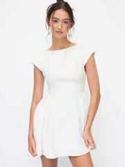 Sculptural Boat Neck Short Sleeve Cut Out Backless Ruffle Mini Dress