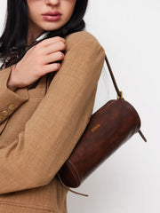 DISTRESSED CYLINDRICAL SHOULDER BAG
