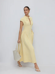 Stand Collar Tie-Neck Short Sleeve Draped Pocket Flared Maxi Dress