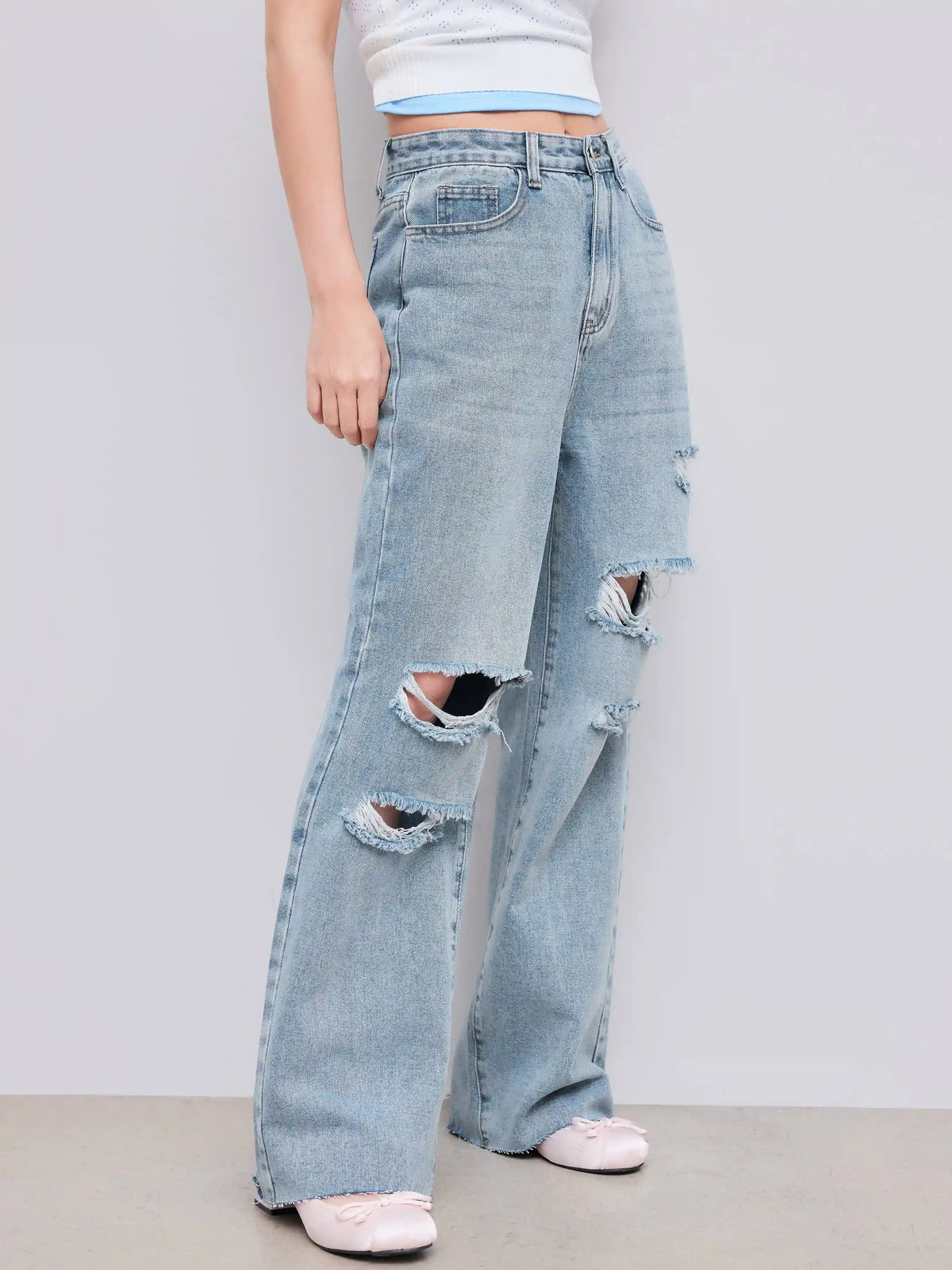Mid Rise Ripped Straight Leg Jeans