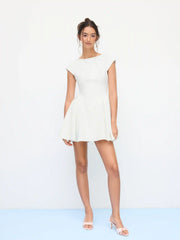 Sculptural Boat Neck Short Sleeve Cut Out Backless Ruffle Mini Dress