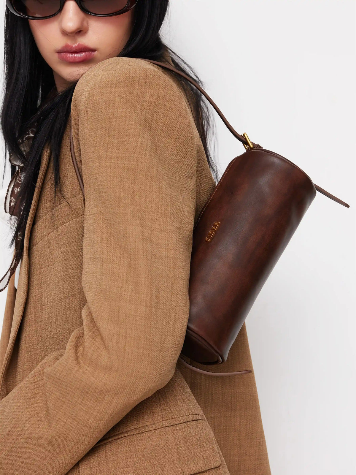 DISTRESSED CYLINDRICAL SHOULDER BAG