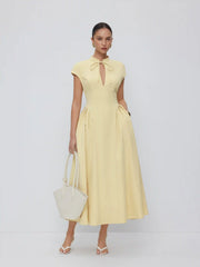 Stand Collar Tie-Neck Short Sleeve Draped Pocket Flared Maxi Dress