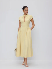 Stand Collar Tie-Neck Short Sleeve Draped Pocket Flared Maxi Dress